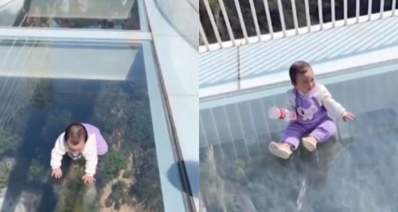 Bebê engatinha sobre ponte de vidro suspensa a 300 metros.